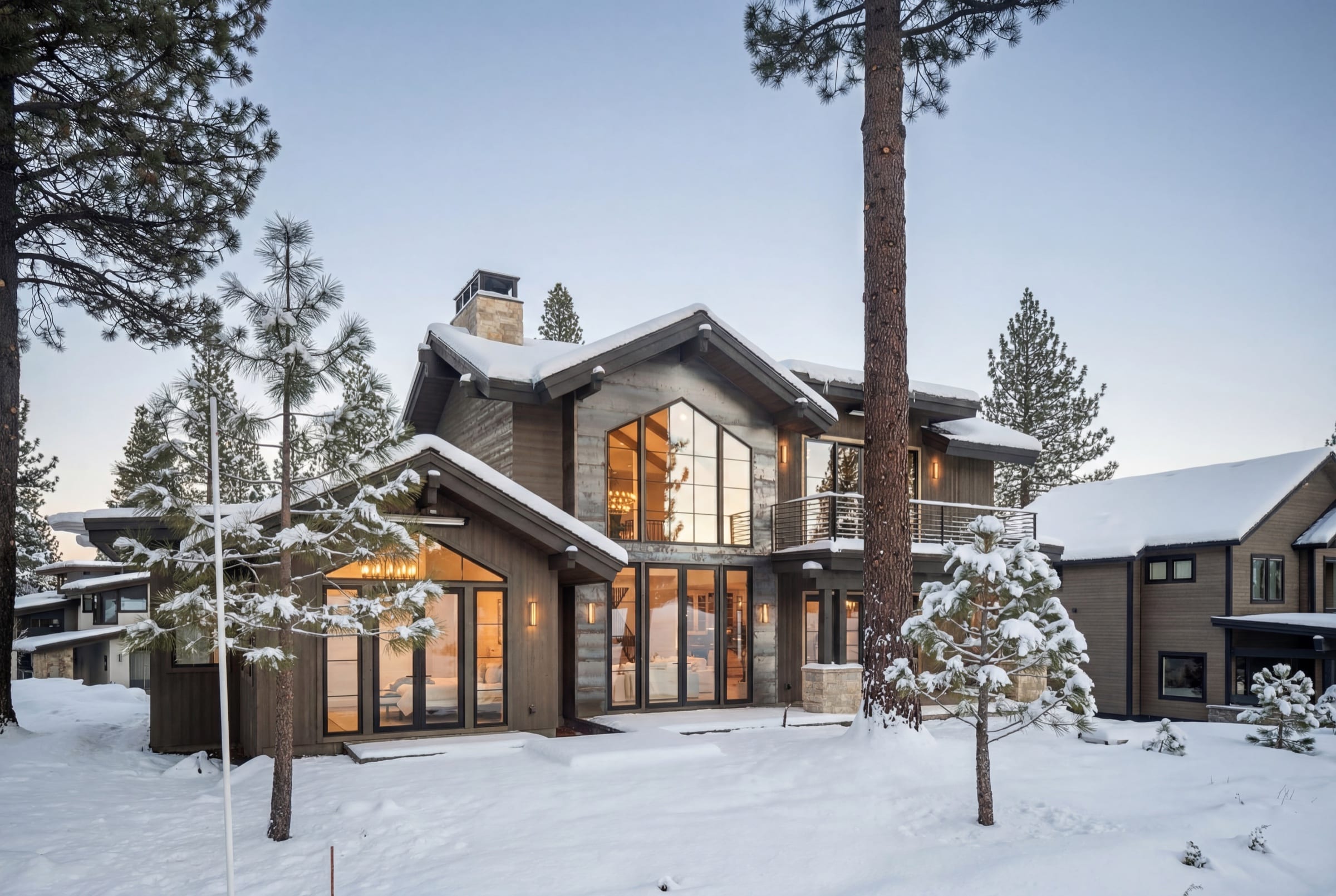 Mountain home at twilight in fresh snow, photographed by The Visaro